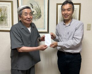 YSP伊澤さんから贈呈資金を受領